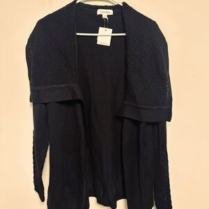 Black Calvin Klein sweater.